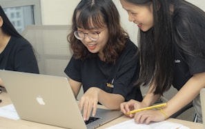 woman using MacBook