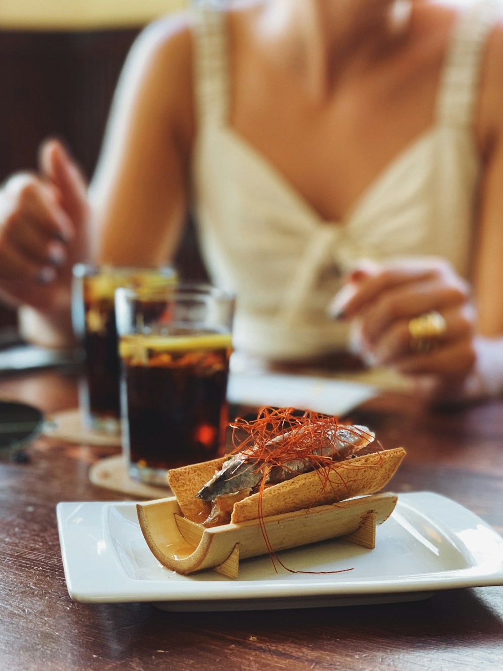 cooked food beside two clear drinking glasses