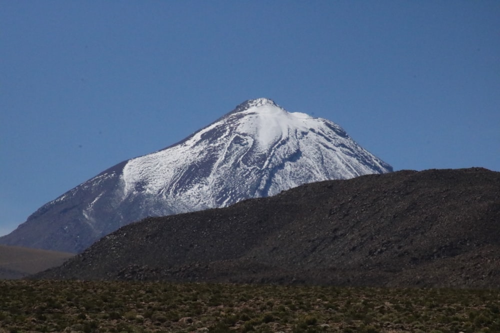 white mountain under blue sky