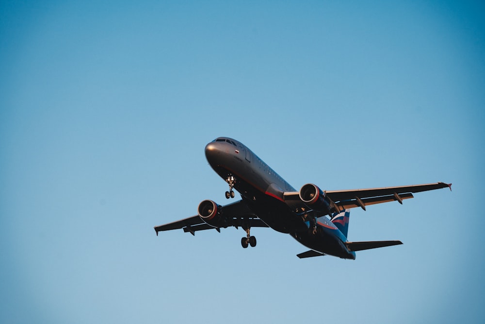 airplane under blue sky