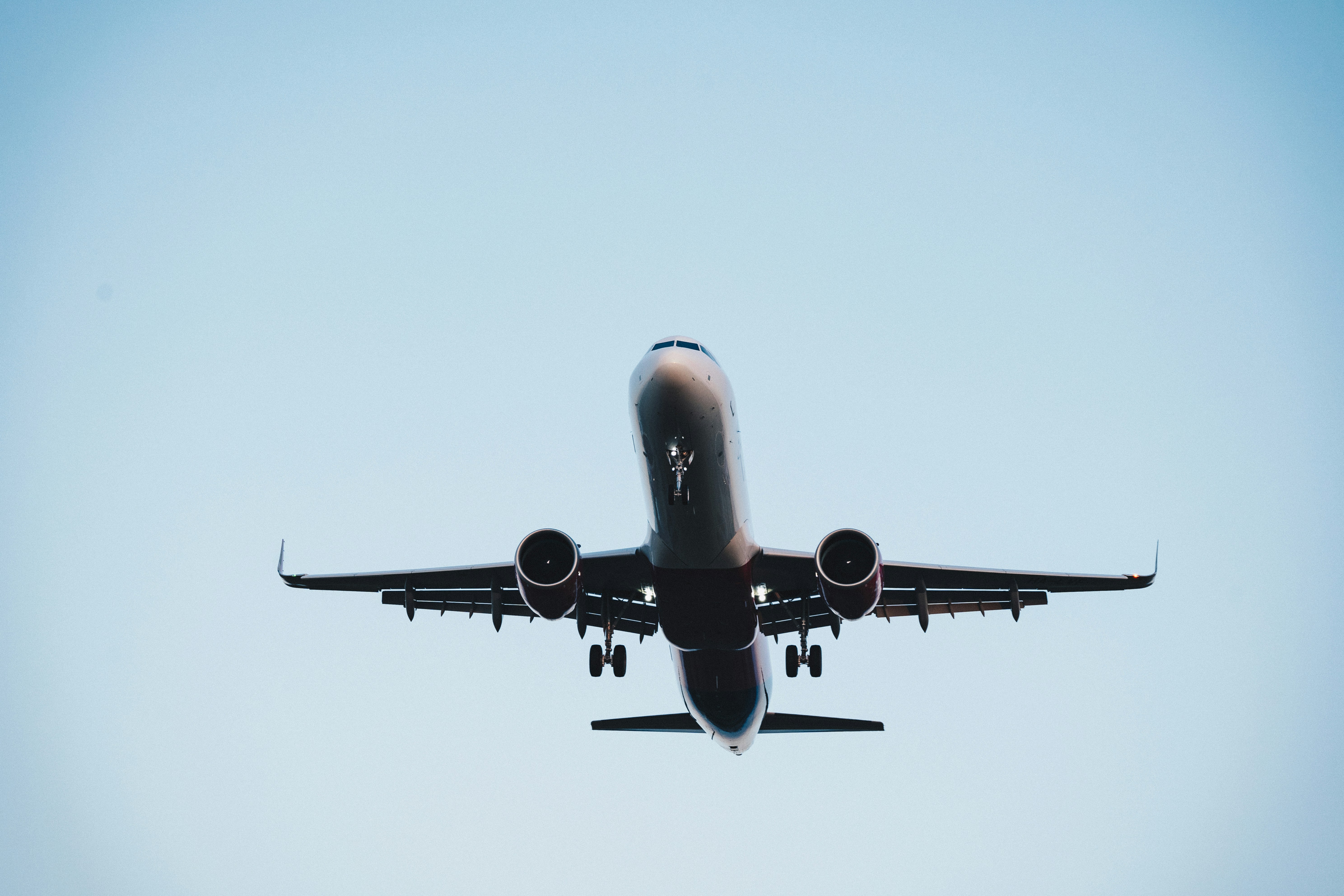 Flying black and gray plane photo – Free Aircraft Image on Unsplash