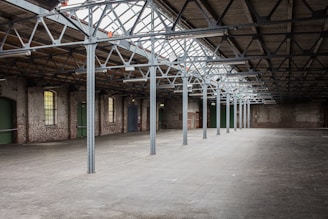 Spacious industrial warehouse with modern design elements and clean lines.