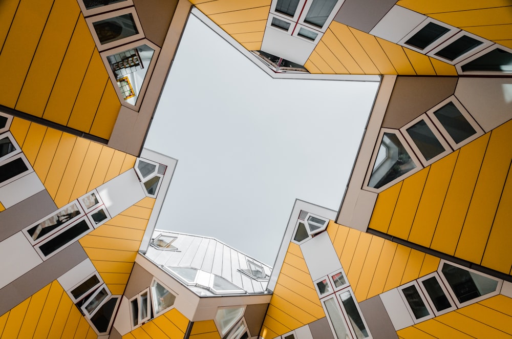 a view from the ground looking up at a building