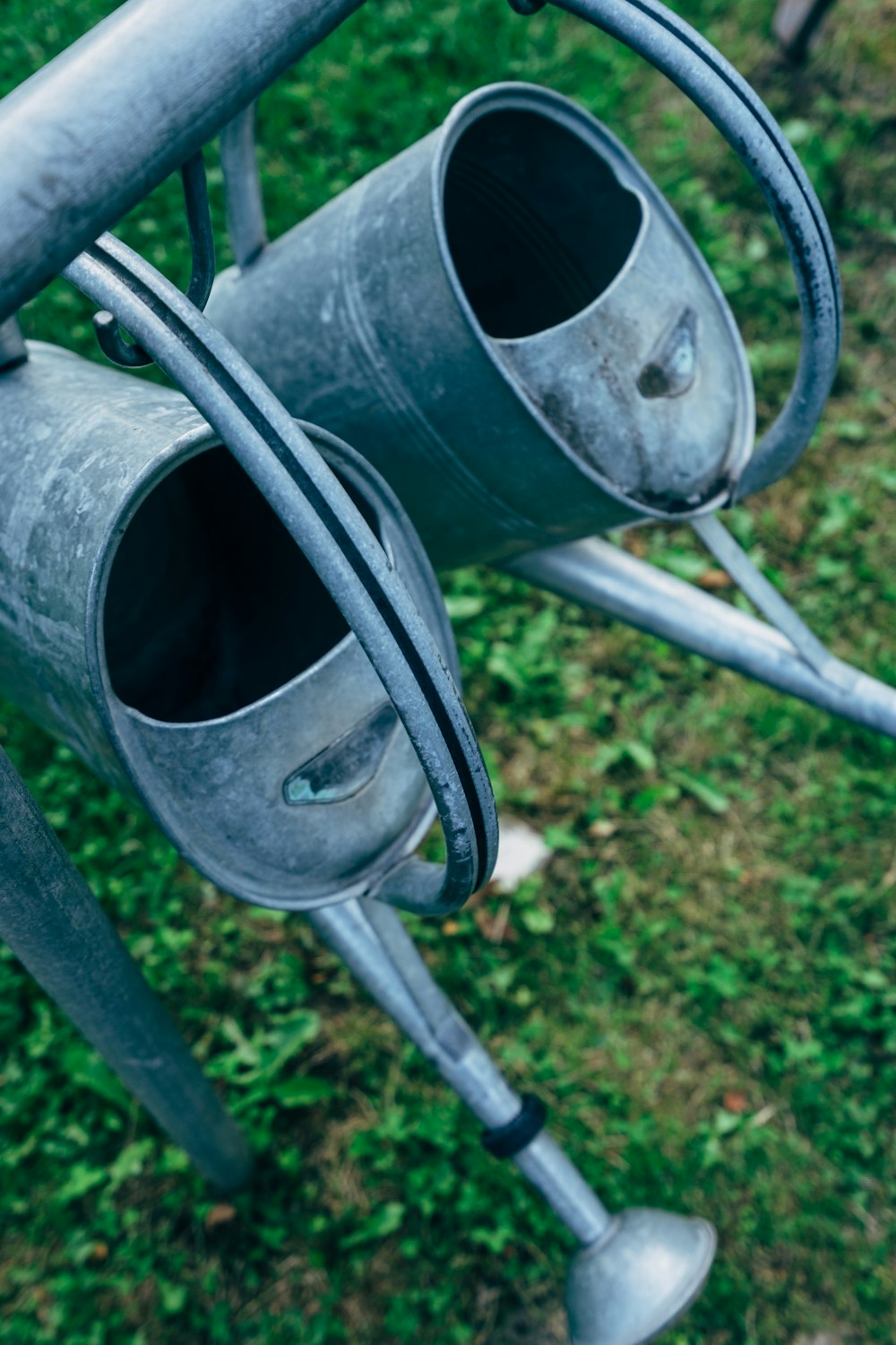 grey stainless steel watering cans