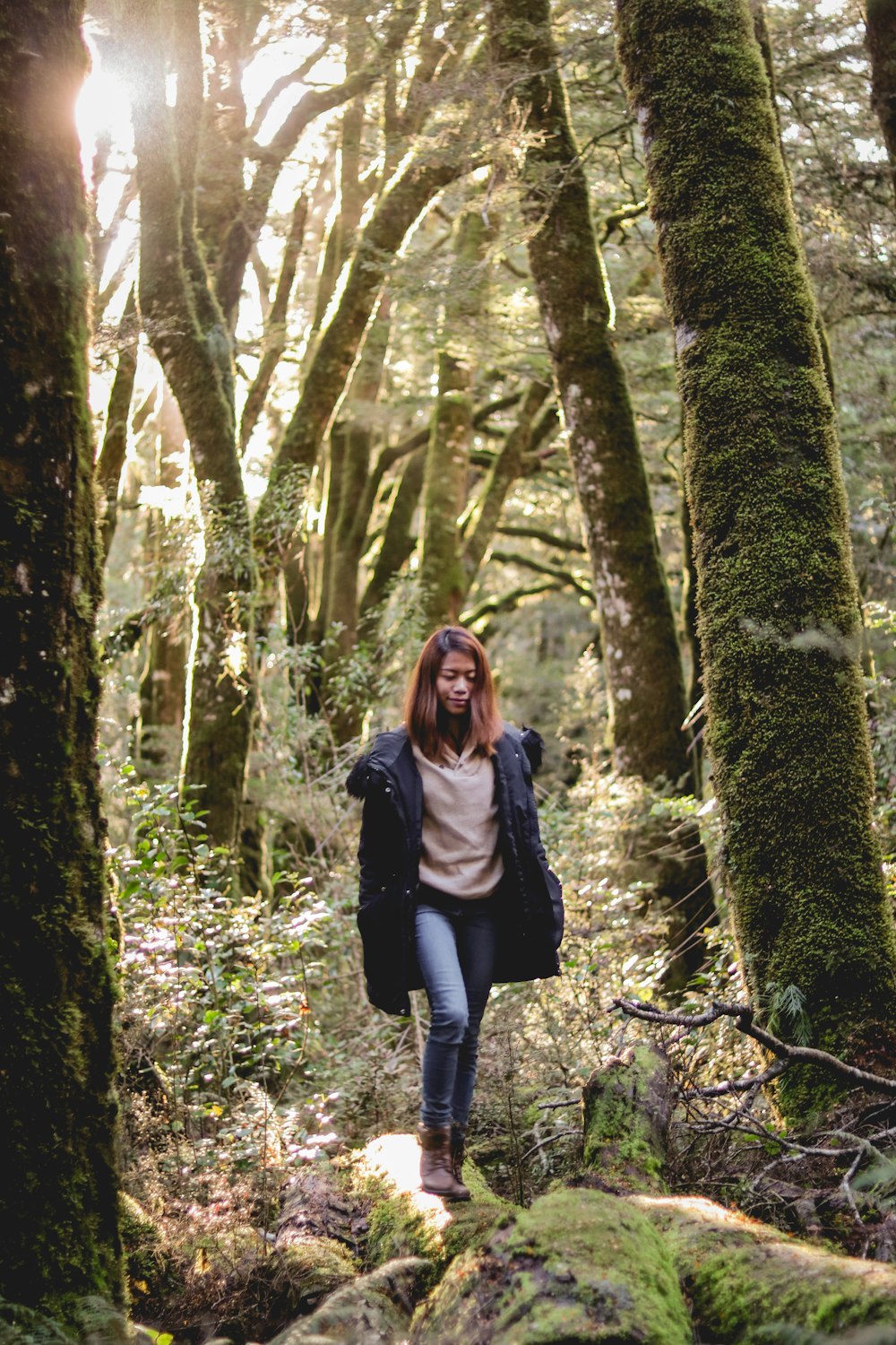 woman surrounded by trees