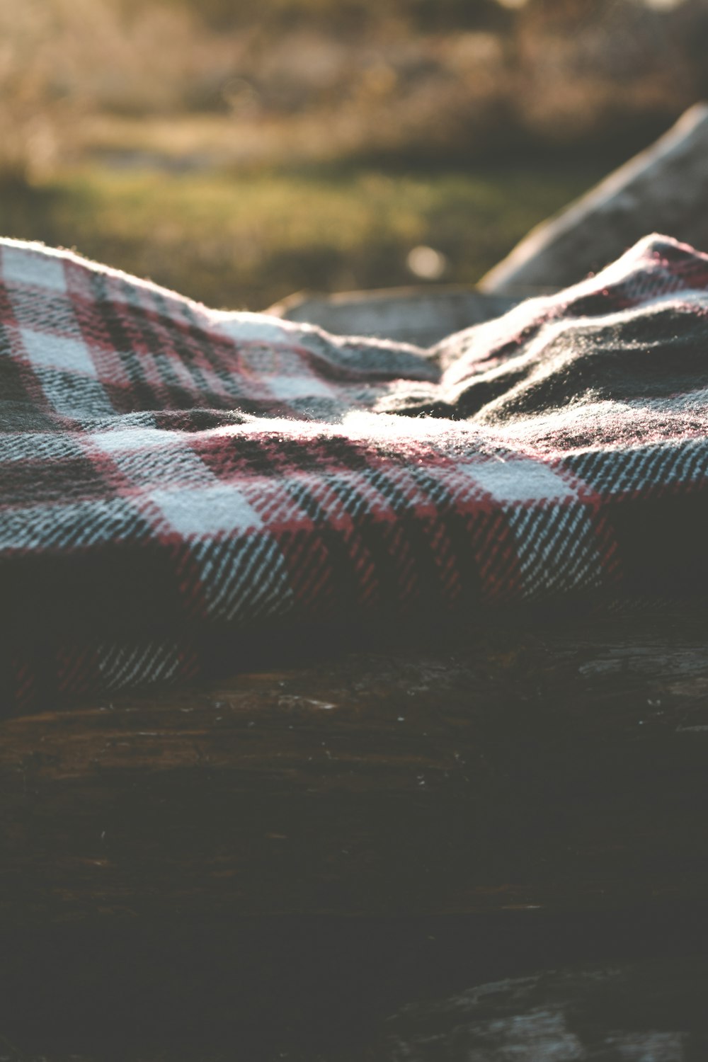 red and white plaid textile