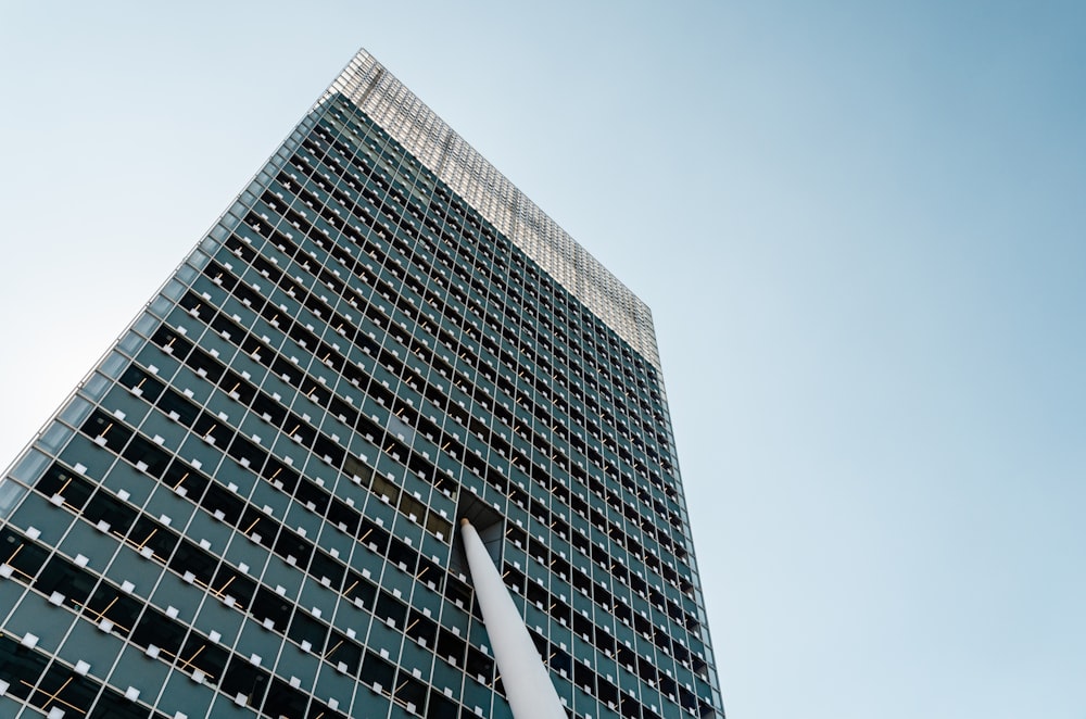 high-rise building under blue sky