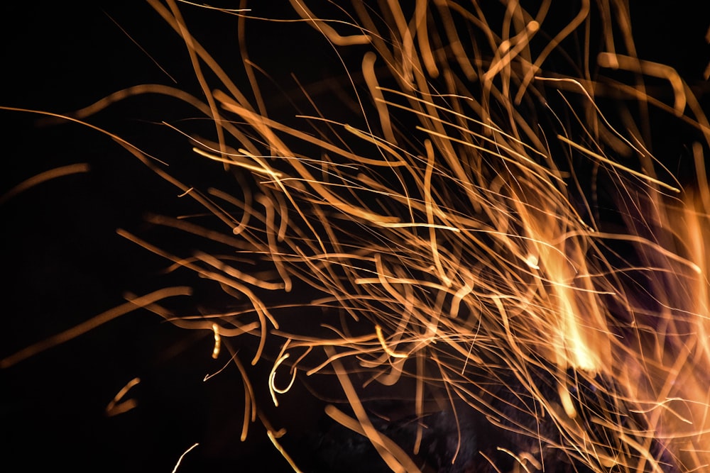 a close up of a fire in the dark