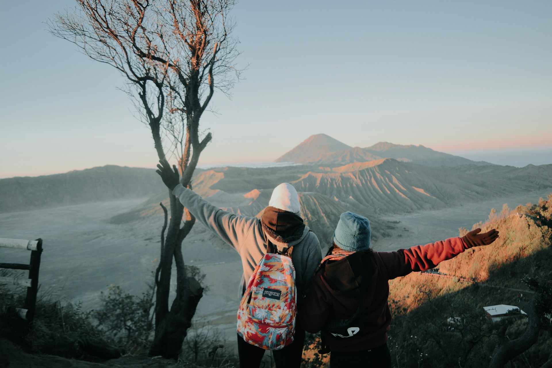 two person looking at mountains