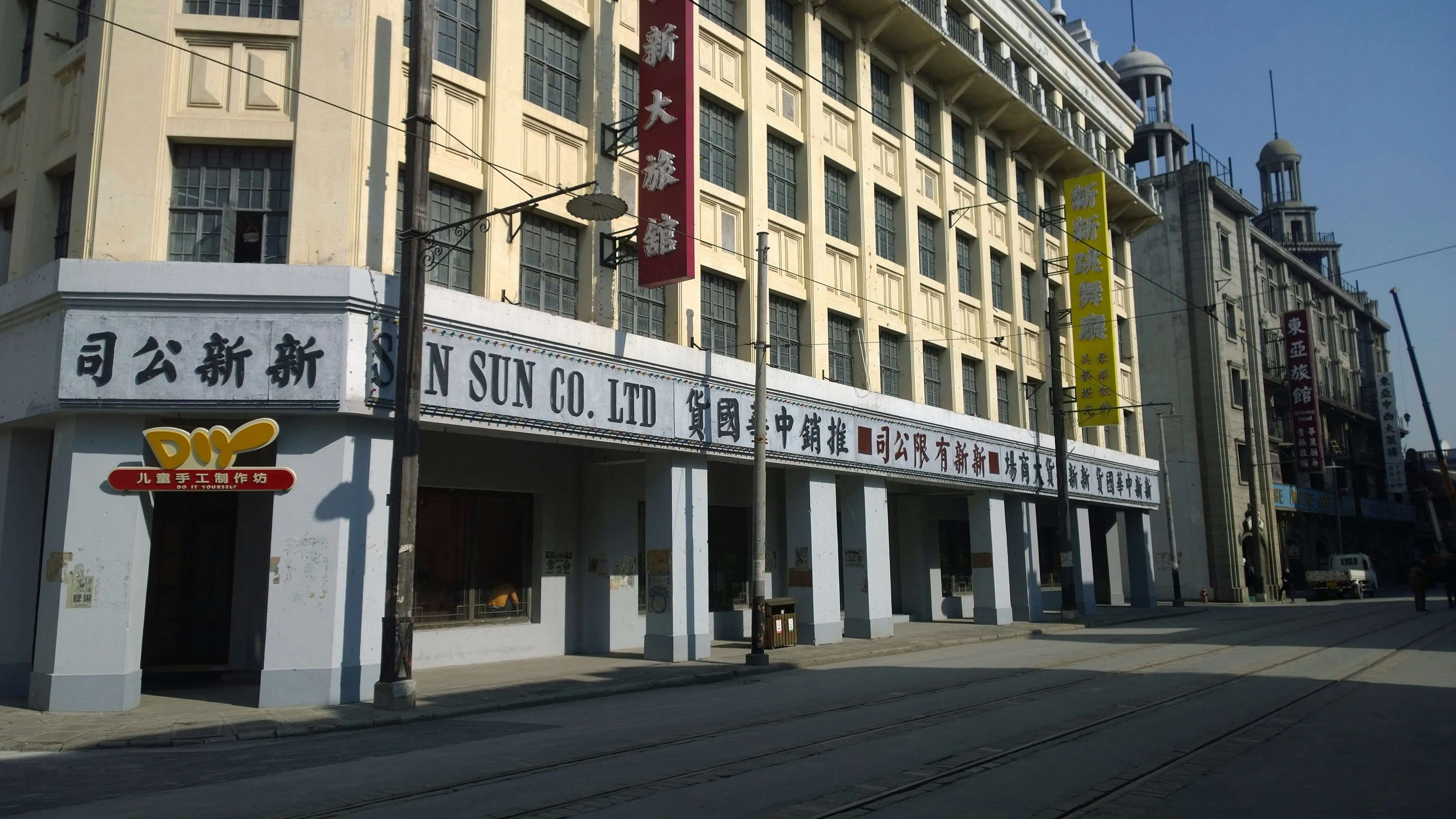 concrete building beside road