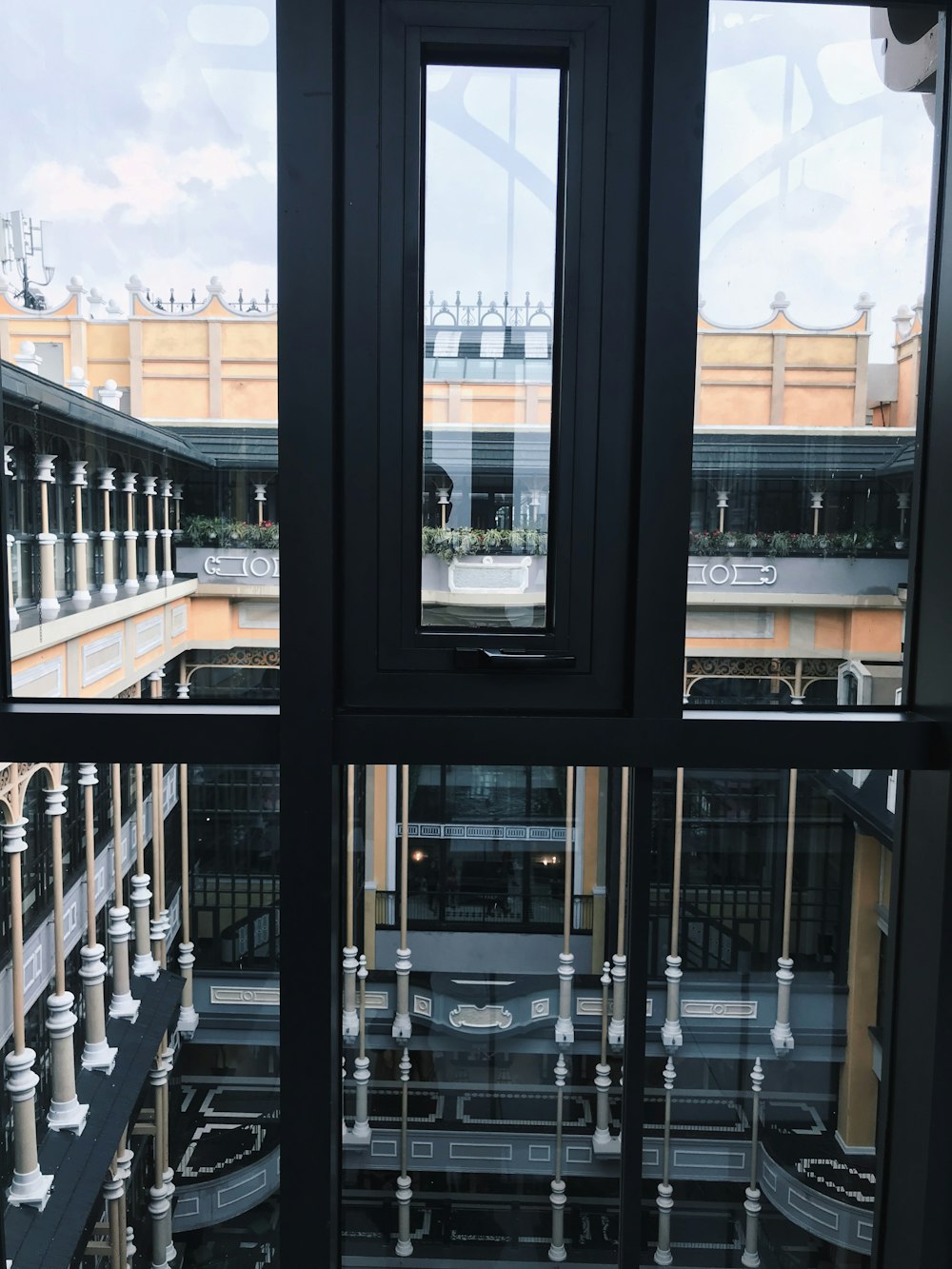 a view of a building through a glass window