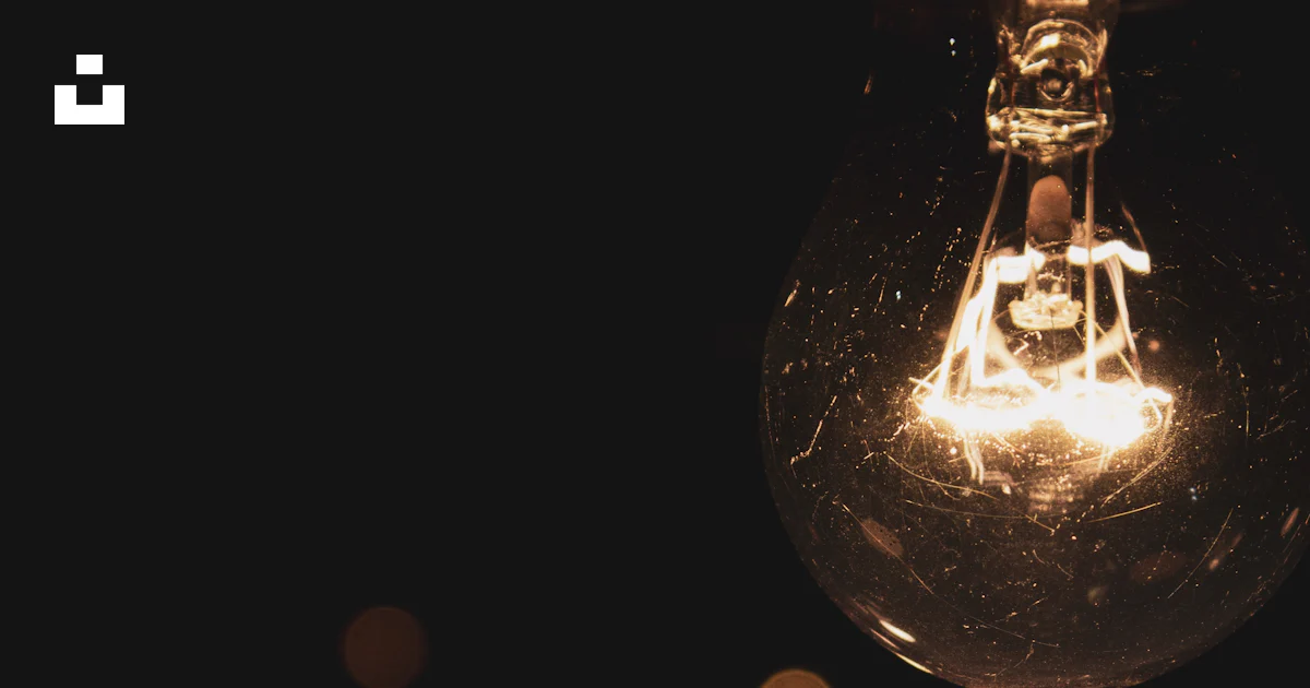 Turned-on brown light bulbs on black room photo – Free Light Image on ...