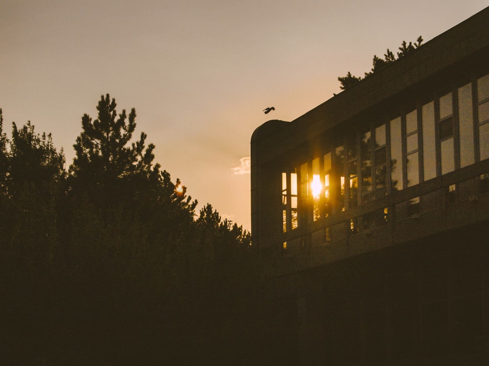 the sun is shining through the windows of a building