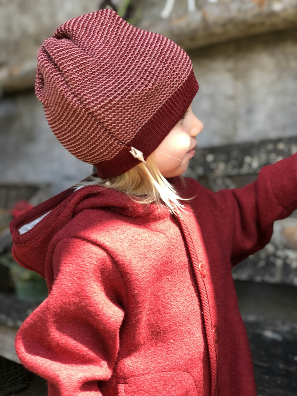 girl wearing red jacket