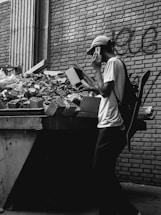 A friendly customer service representative wearing a headset, ready to assist with construction and demolition inquiries.