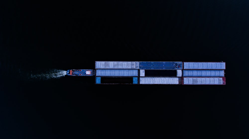 a large container ship floating on top of a body of water