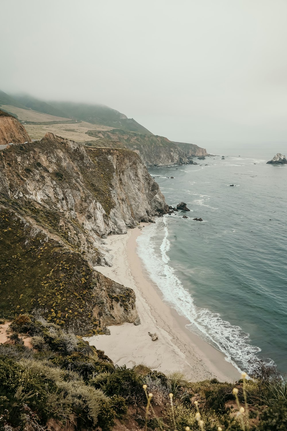 rocky cliff facing ocean