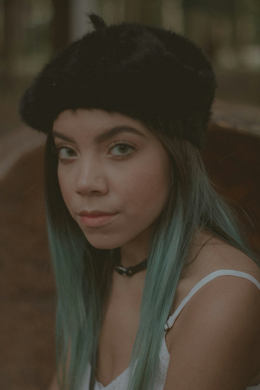 woman wearing black hat