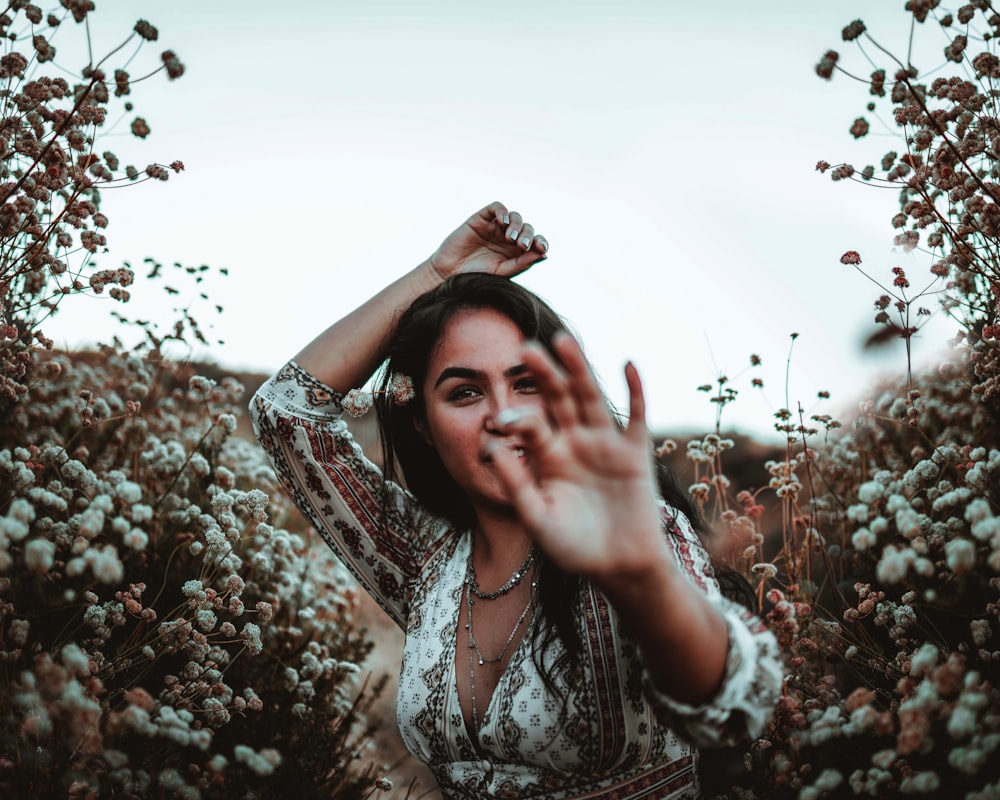 woman on flower field