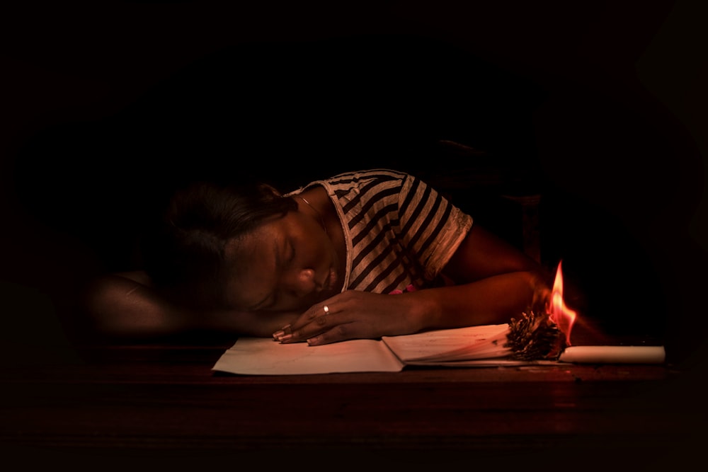 woman sleeping on table