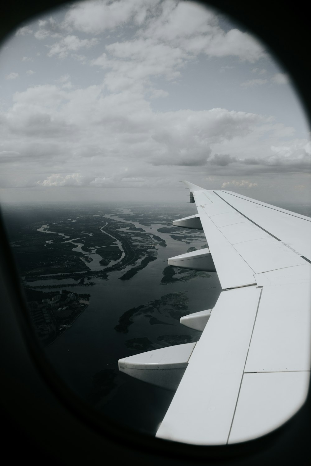 white airliner flying on sky