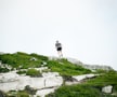 man on mountain cliff