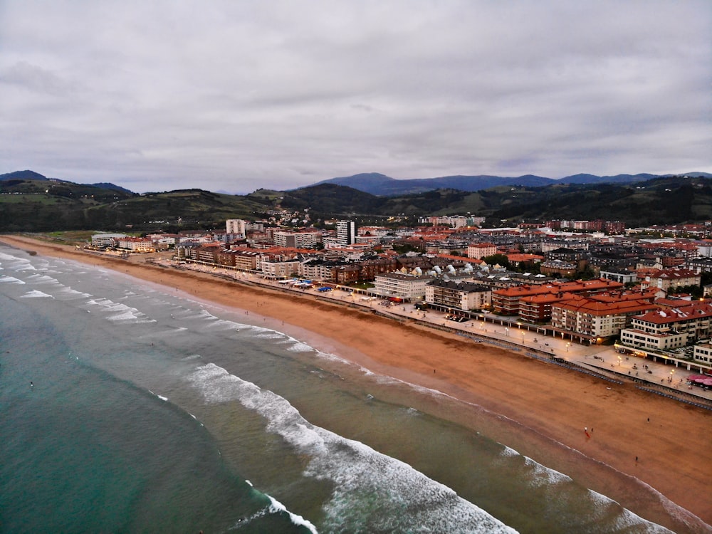 aerial view of buildings near ocean