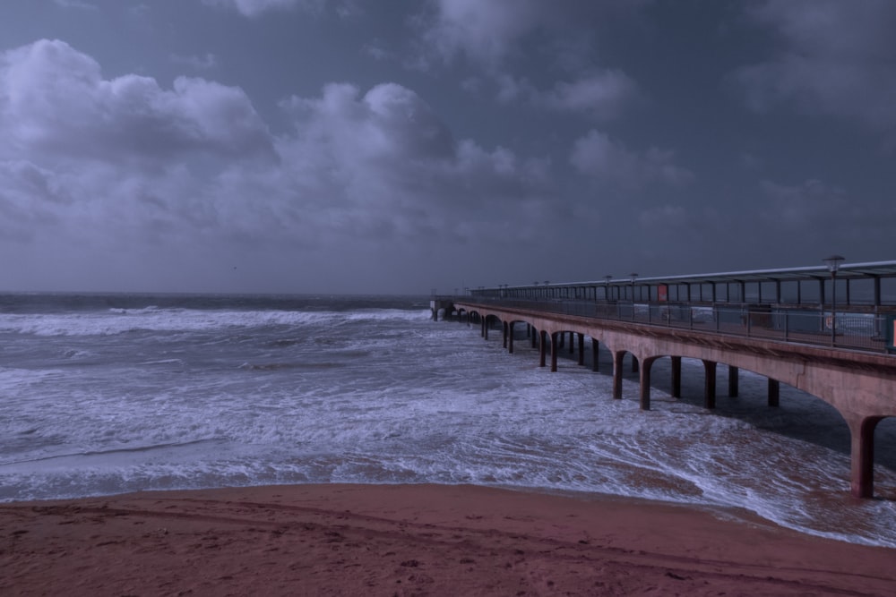 ocean under cloudy sky