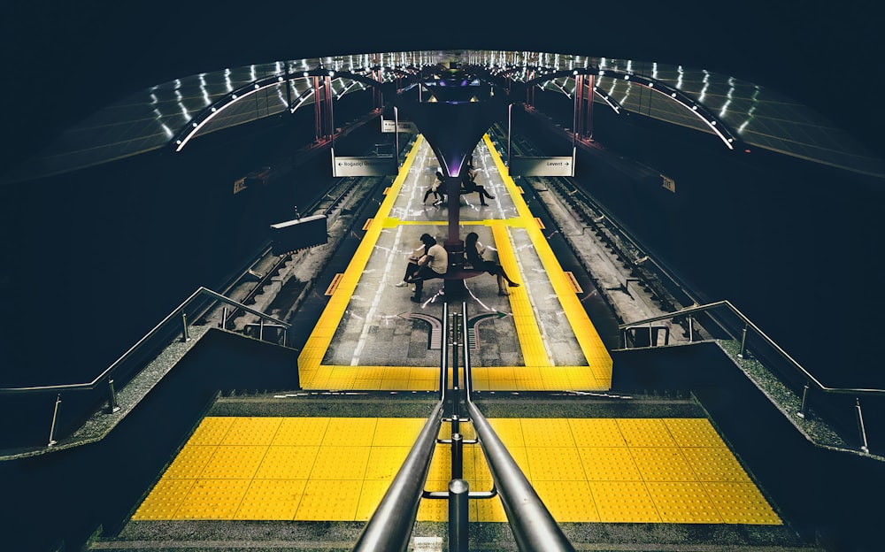 people sitting on bench