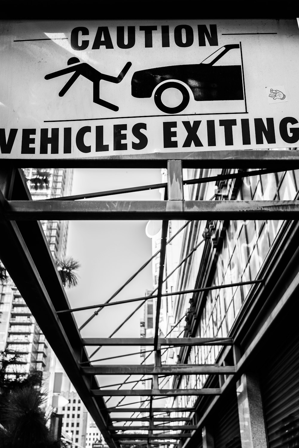 grayscale photography of caution signage