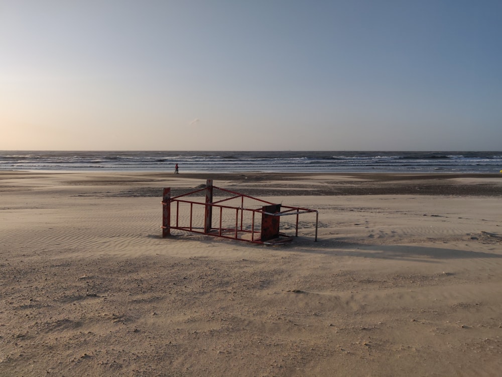 lifeguard tower on it's side on seashore