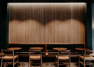 Cozy common room with warm lighting and comfortable seating at the youth hostel.