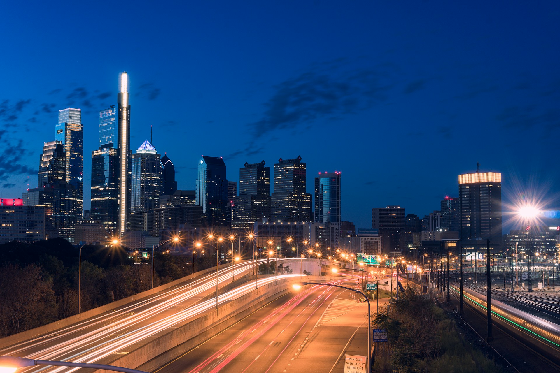 timelapse photography of street and high-rise buildings