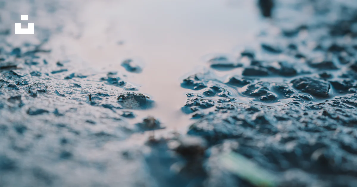 Gray Puddle A puddle of water that is on the ground photo – Free Grey Image on Unsplash