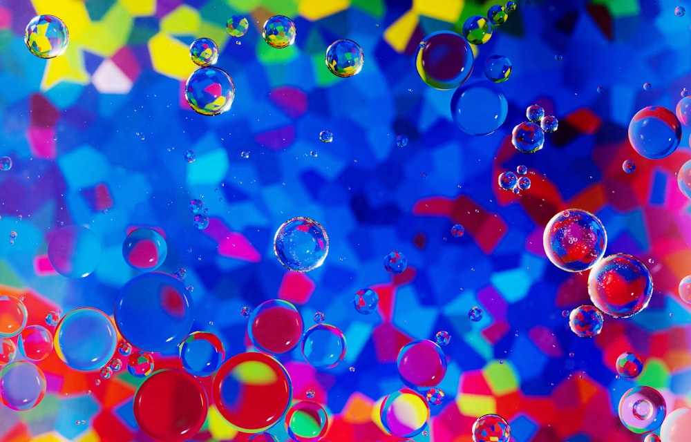 a bunch of bubbles that are floating in the air