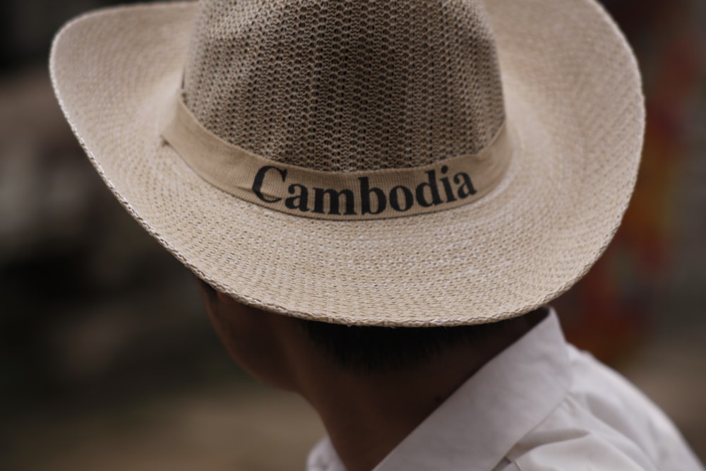 man wearing Cambodia cowboy hat