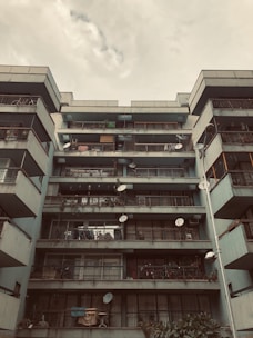 Modern city apartment building with AT&T internet connectivity symbols.
