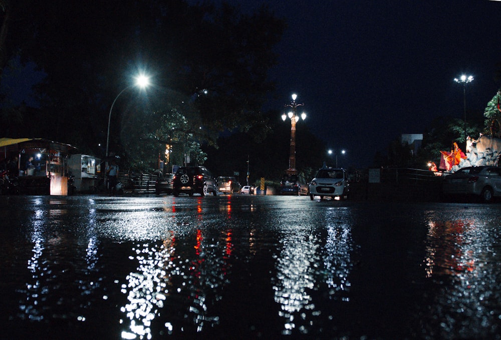 white vehicle on road during nighttime