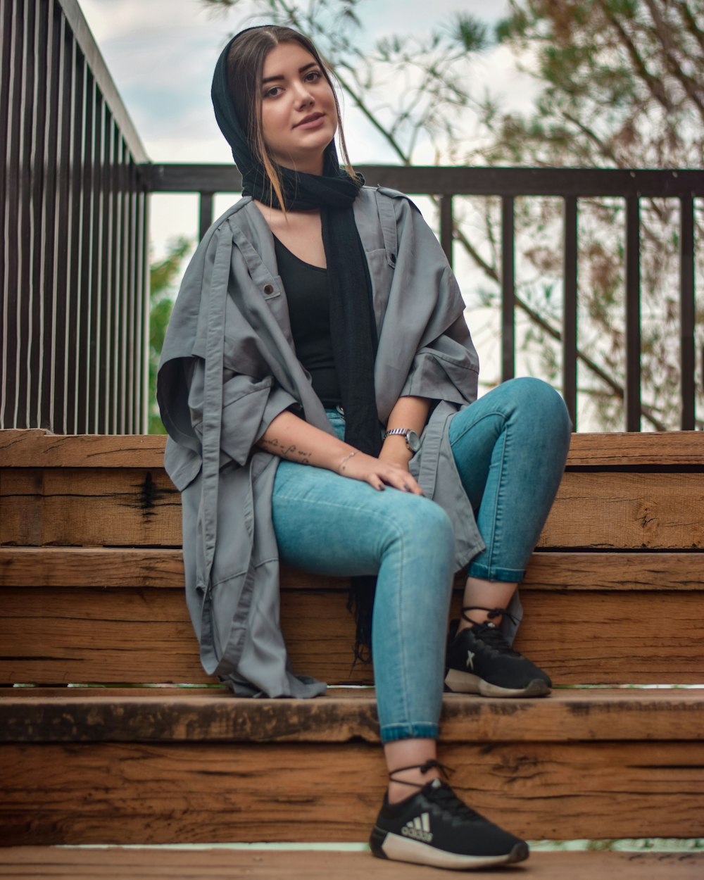 woman sitting on stairs