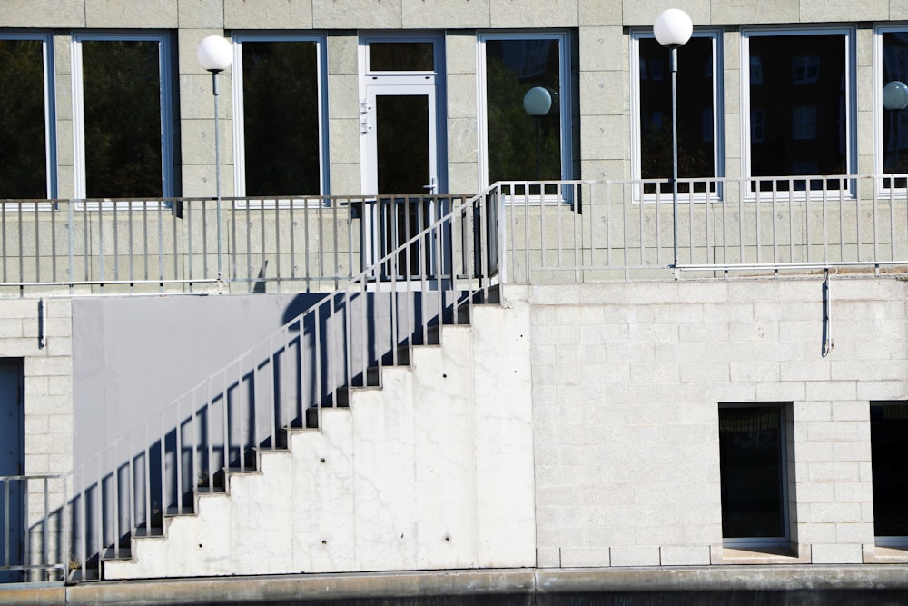 empty gray concrete stair during daytime