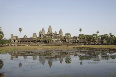 Angkor Wat reflected in the lotus pond (via Unsplash)