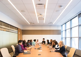 people sitting on conference room