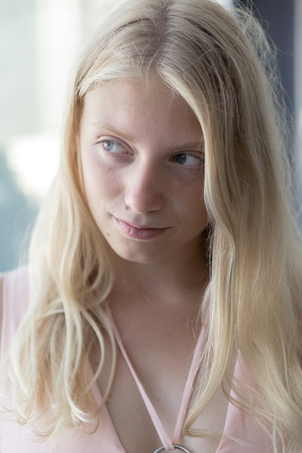 woman wearing pink top