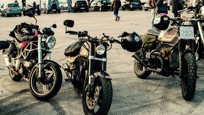 Three motorcycles riding together on an open road, the kind of group ride that has been part of Las Vegas Bikefest for 25 years