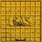 A yellow metal panel with a grid pattern and raised text that reads 'GAS' in the center, surrounded by signs of weathering and dirt.