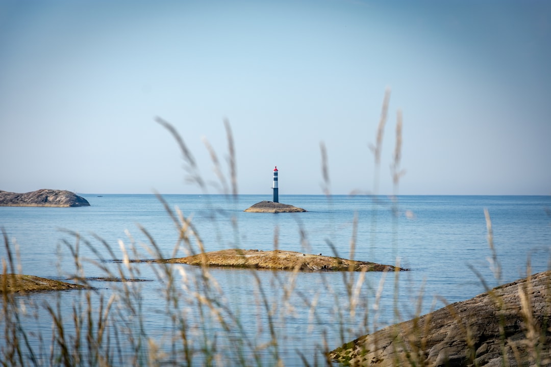 lighthouse under blue sky