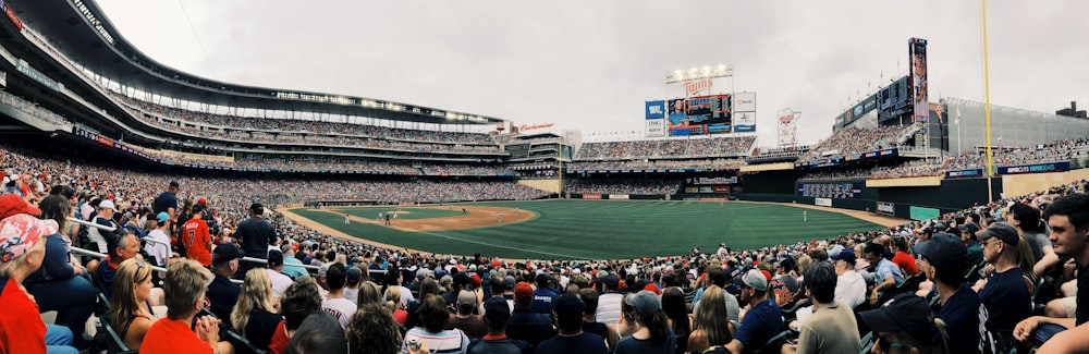 a baseball stadium filled with lots of people
