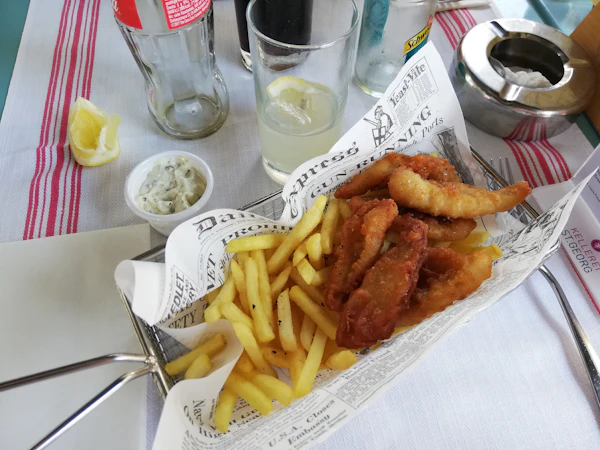 Fish and chips with a drink