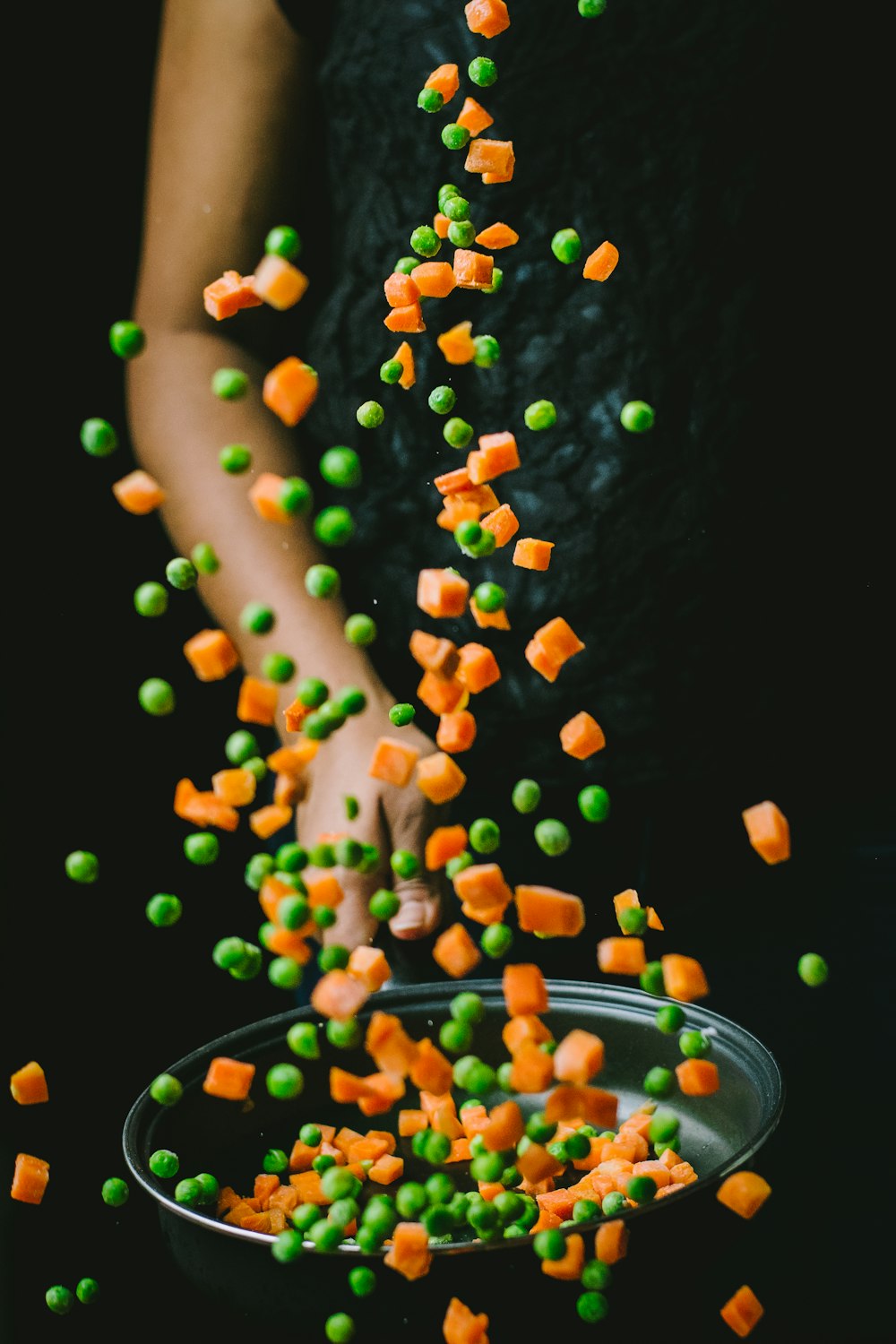 photo of green peas and carrot cubes