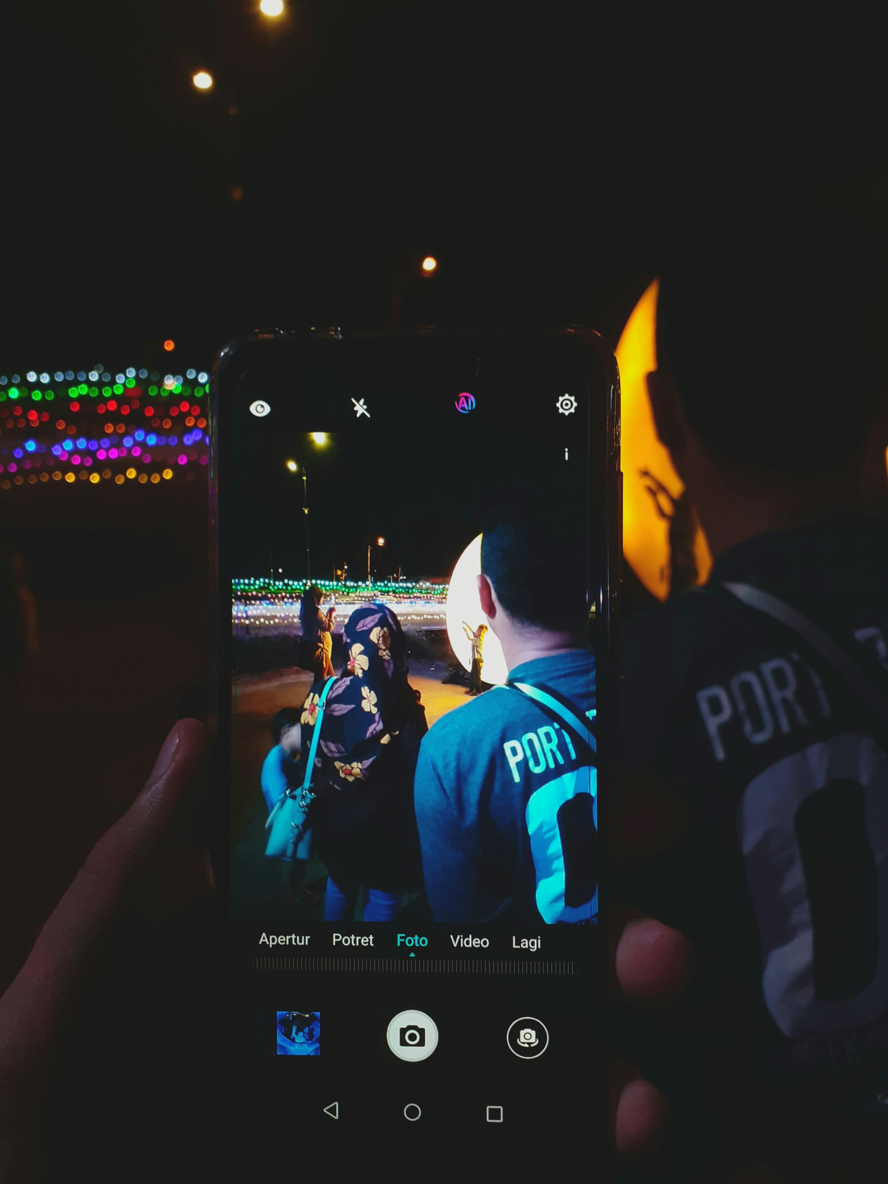 Using my mom phone to take a picture